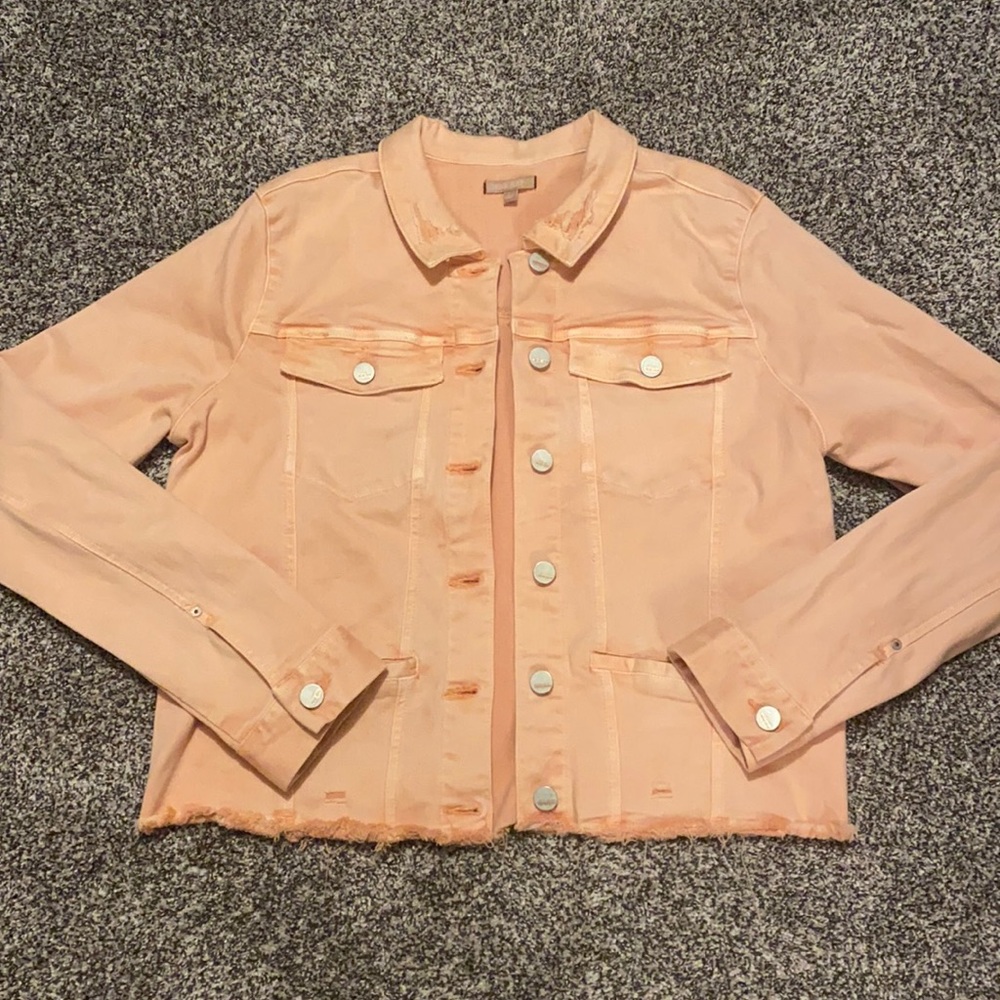 Coral denim jacket with slight distressing